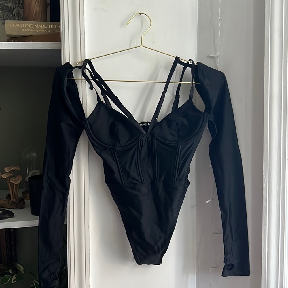 Edgy black corset style bodysuit